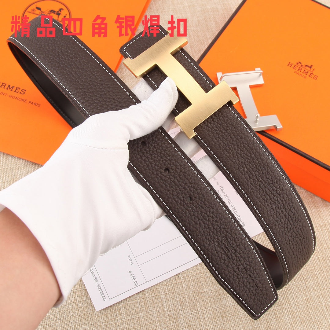 Brown leather belt with gold-tone buckle and white contrast stitching, laid flat.