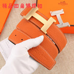 Hermes leather belt orange with silver H buckle and stitched keeper strap