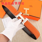 Hermes leather belt with orange textured strap and silver H buckle