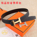 Black pebbled leather belt with gold-tone H buckle and black keeper strap