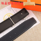 Black leather belt with metal buckle and stitched strap keeper