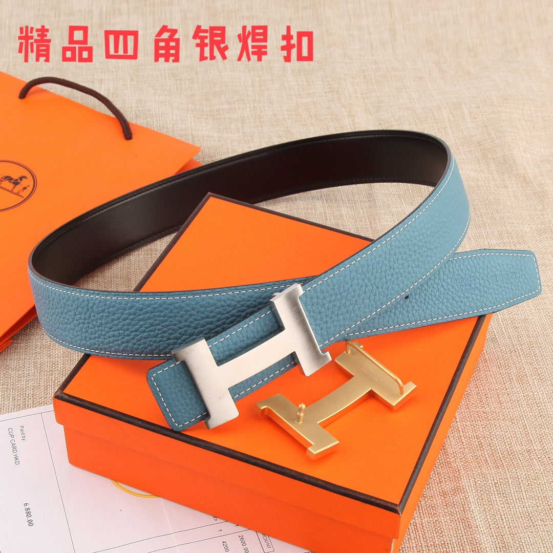 Hermes belt with blue leather strap, white stitching, metal H buckle and matching keeper tab