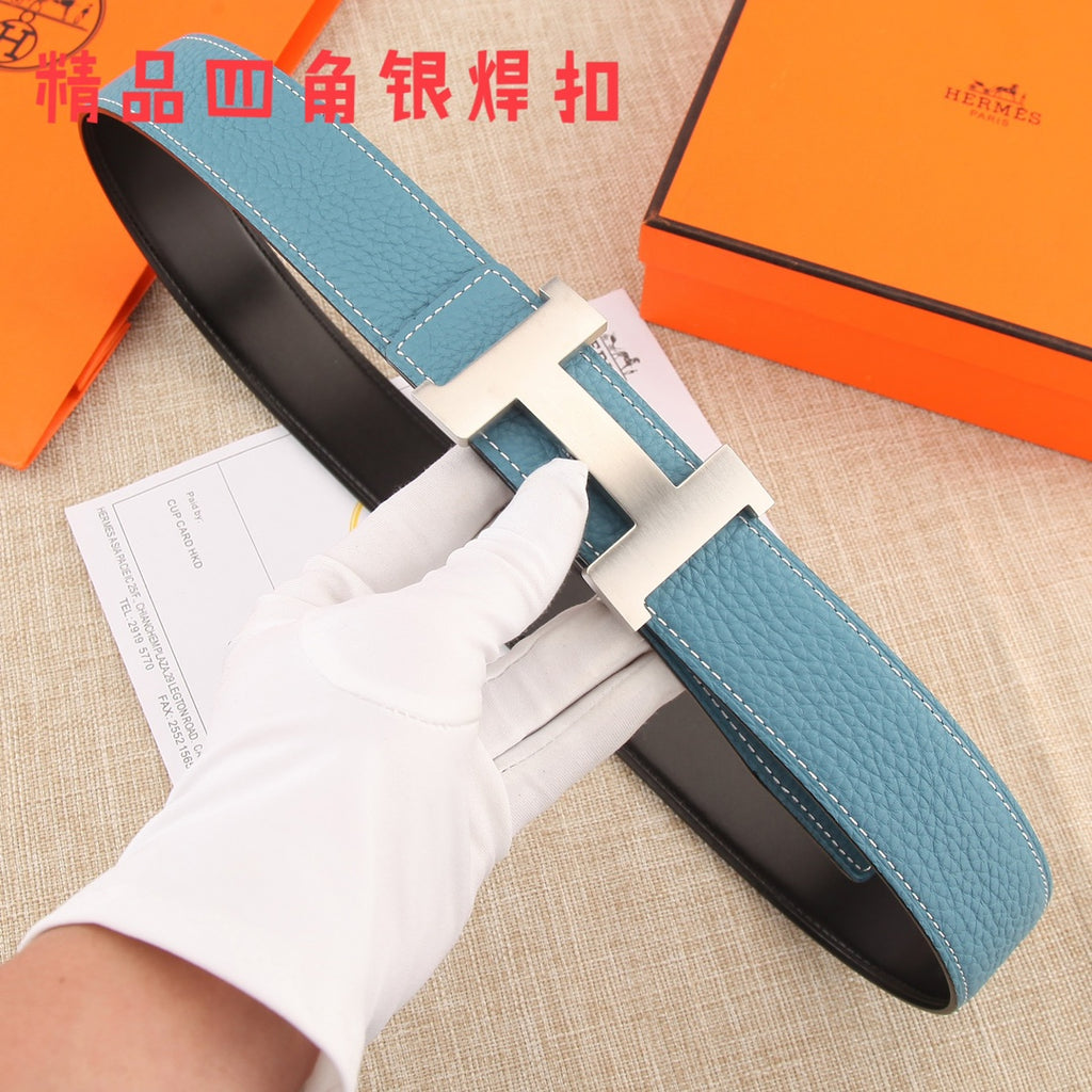 Hermes belt with textured blue leather strap, white contrast stitching, metal H buckle