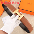 Hermes leather belt with brown textured strap and gold-tone H buckle, stitched edges.