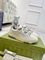 Gucci unisex sneakers, white leather-look with lace-up front and chunky rubber sole