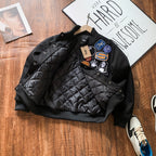 Black bomber jacket with quilted lining and snap front