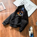 Black bomber jacket with embroidered front patches and ribbed cuffs