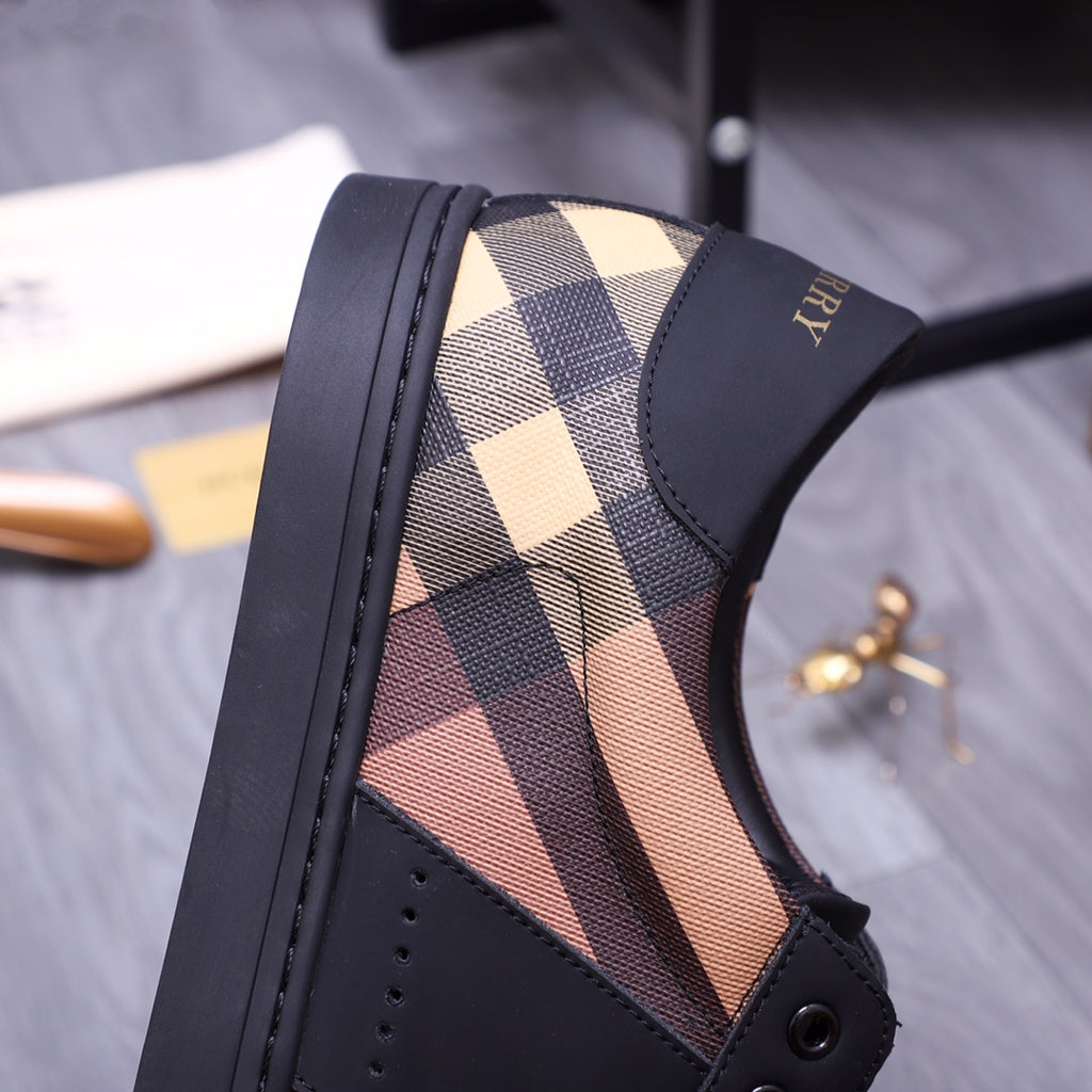 Burberry sneaker side view with check panel, padded collar, and black rubber sole