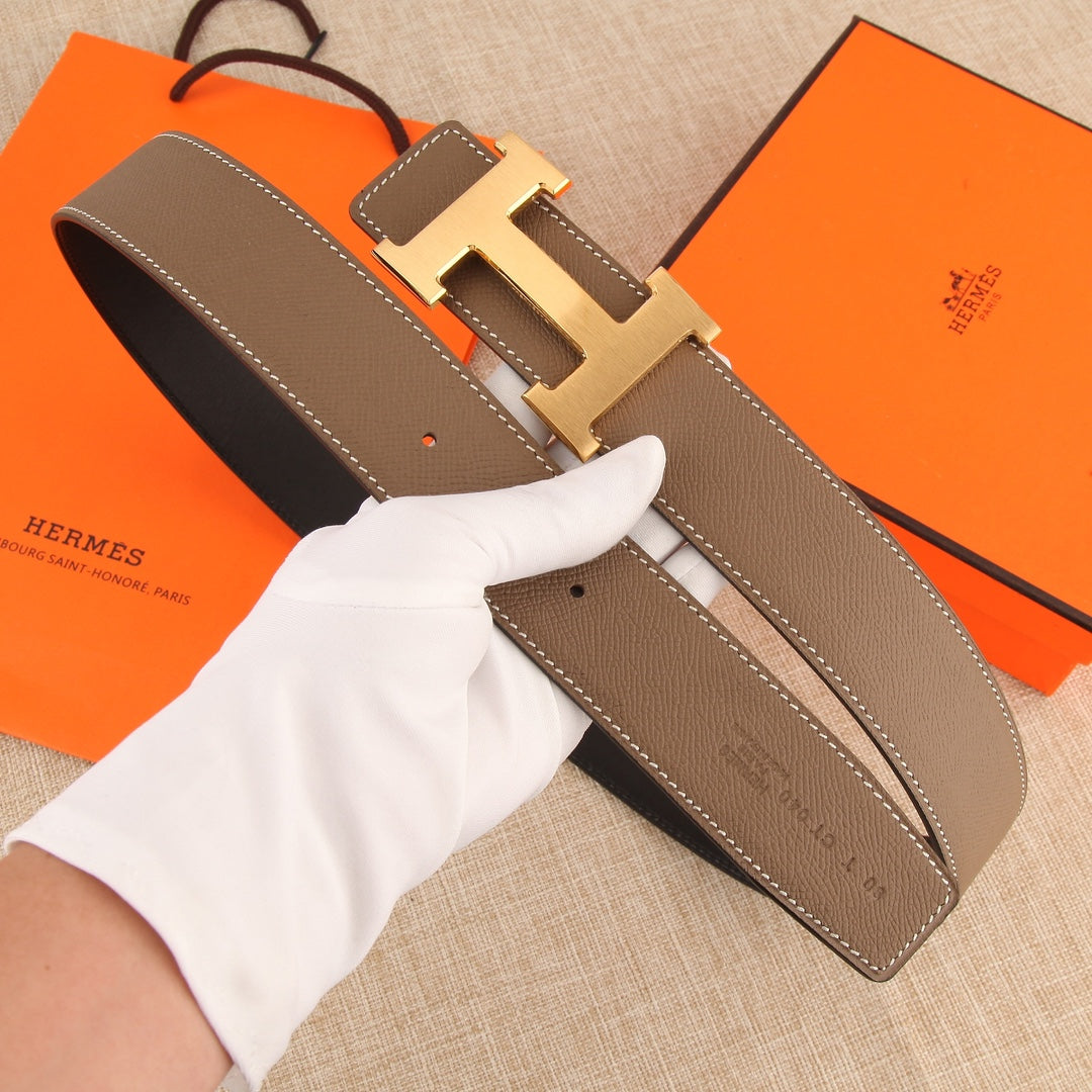 Hermes belt with textured brown leather strap, gold-tone H buckle and stitched edges