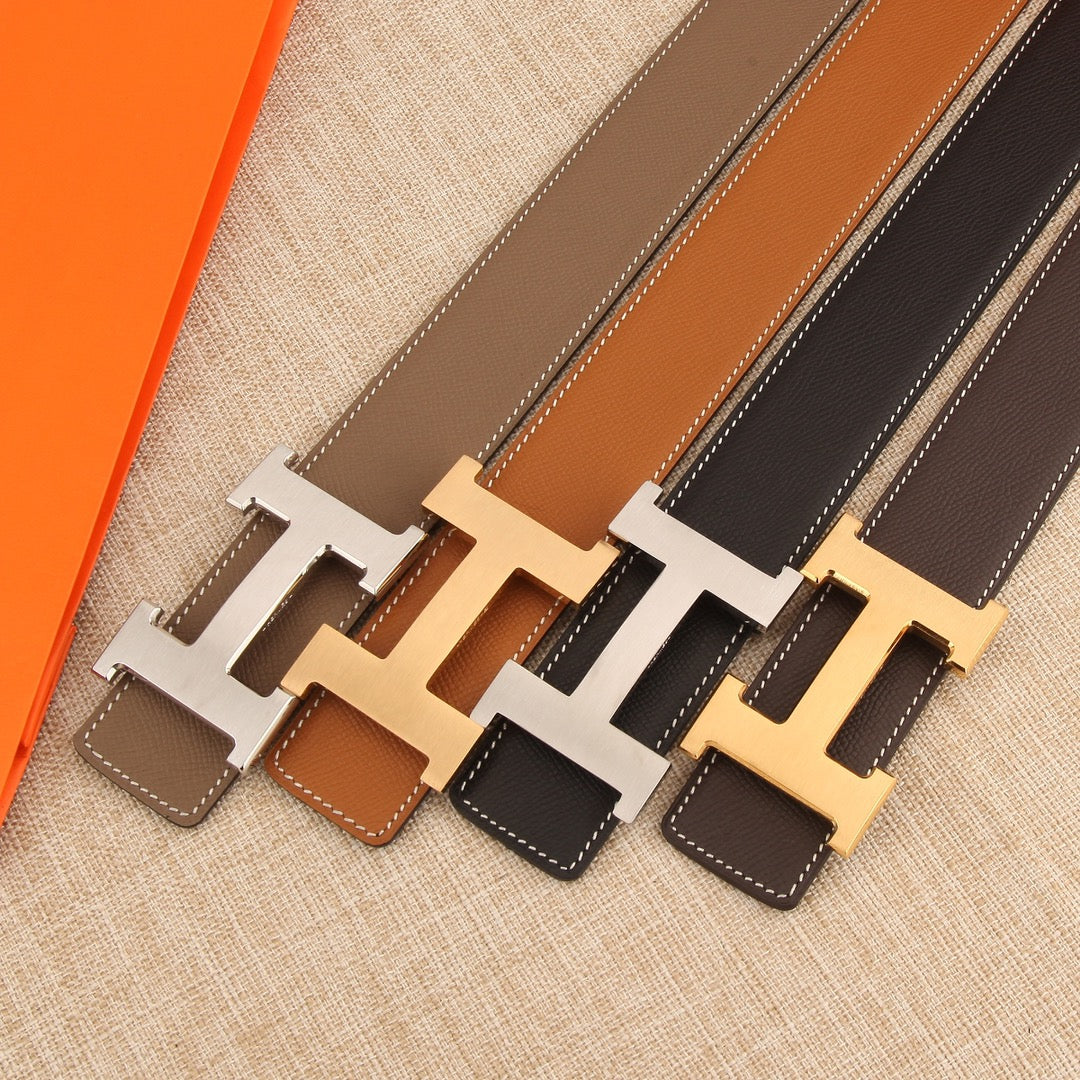 Set of Hermes leather belts in multiple colors with matching silver and gold-tone H buckles