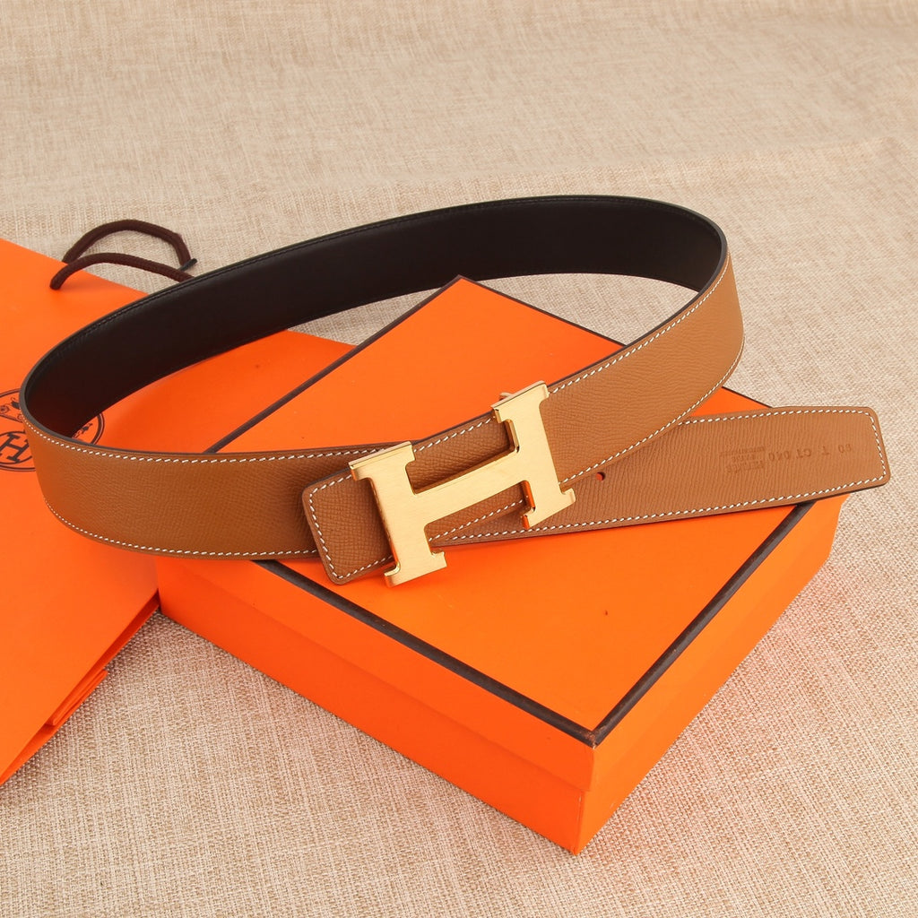 Hermès belt in tan leather with silver buckle and dark inner side