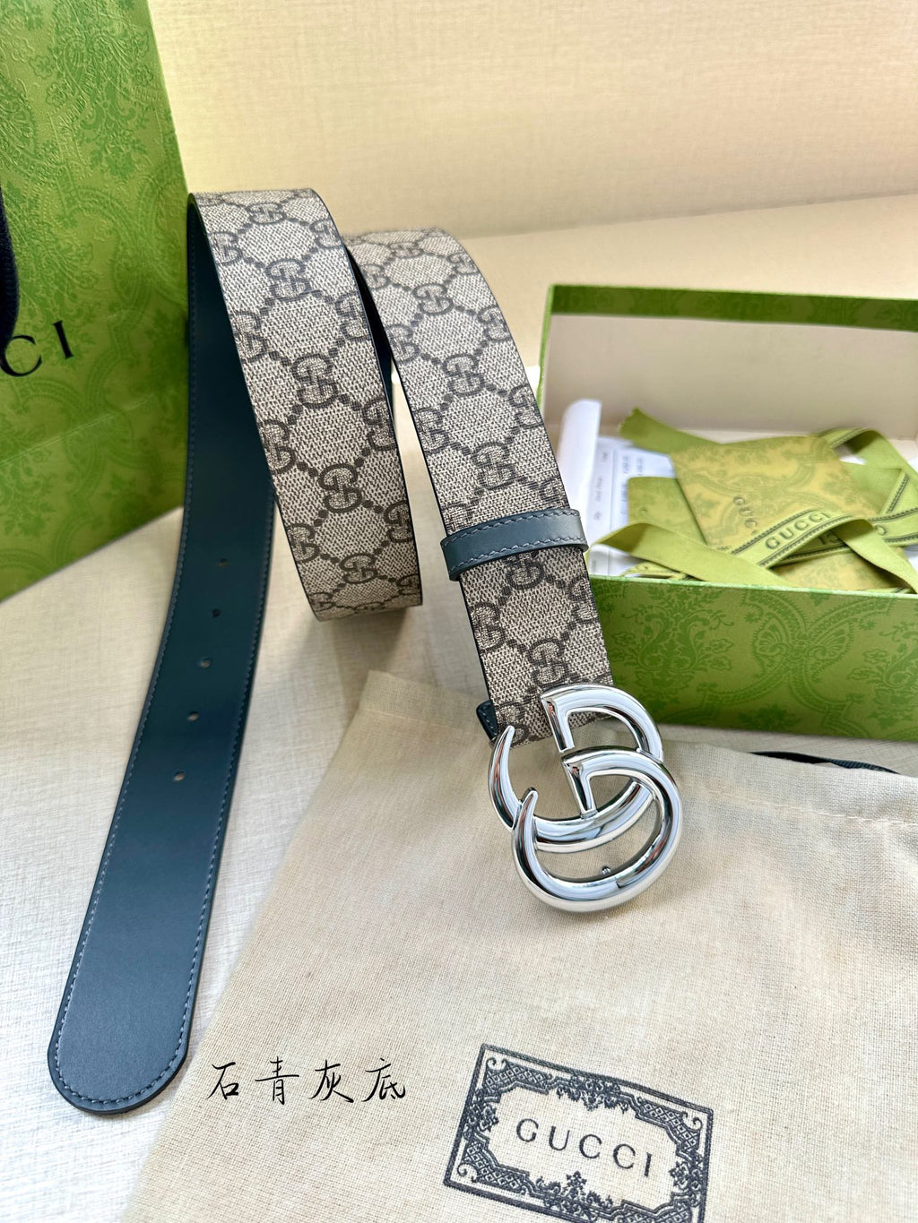 Gucci belt with GG canvas band, blue leather edge, and silver-tone double G buckle