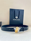 Versace navy leather belt with gold and silver Medusa-style buckle