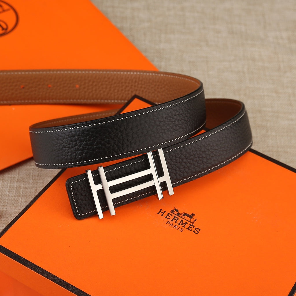 Black leather belt with gold-tone H buckle and contrast white stitching
