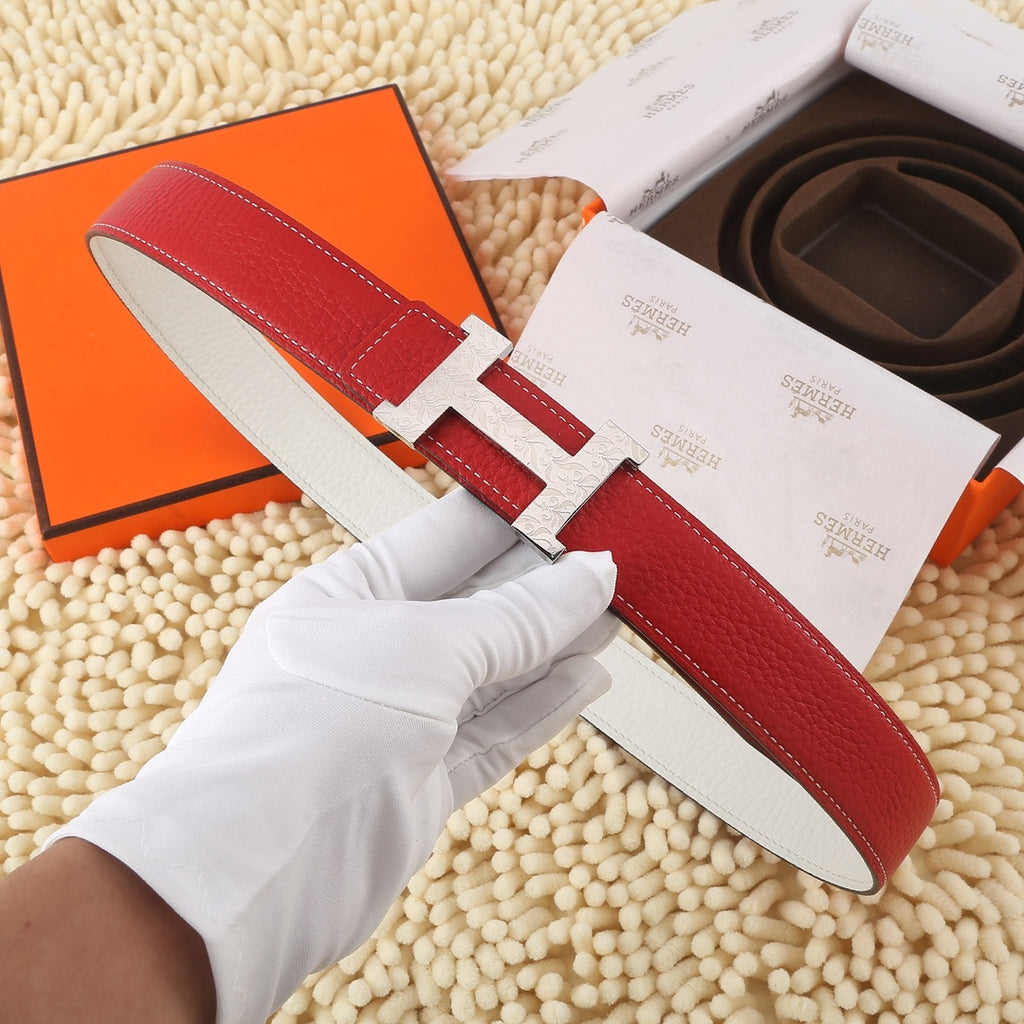 Hermes leather belt with red strap, white edge, and silver-tone H buckle