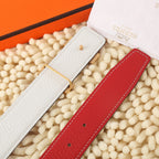 Hermes belt with red leather and white keeper, single row holes detail