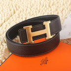Dark leather belt with gold-tone buckle and white contrast stitching, side view.