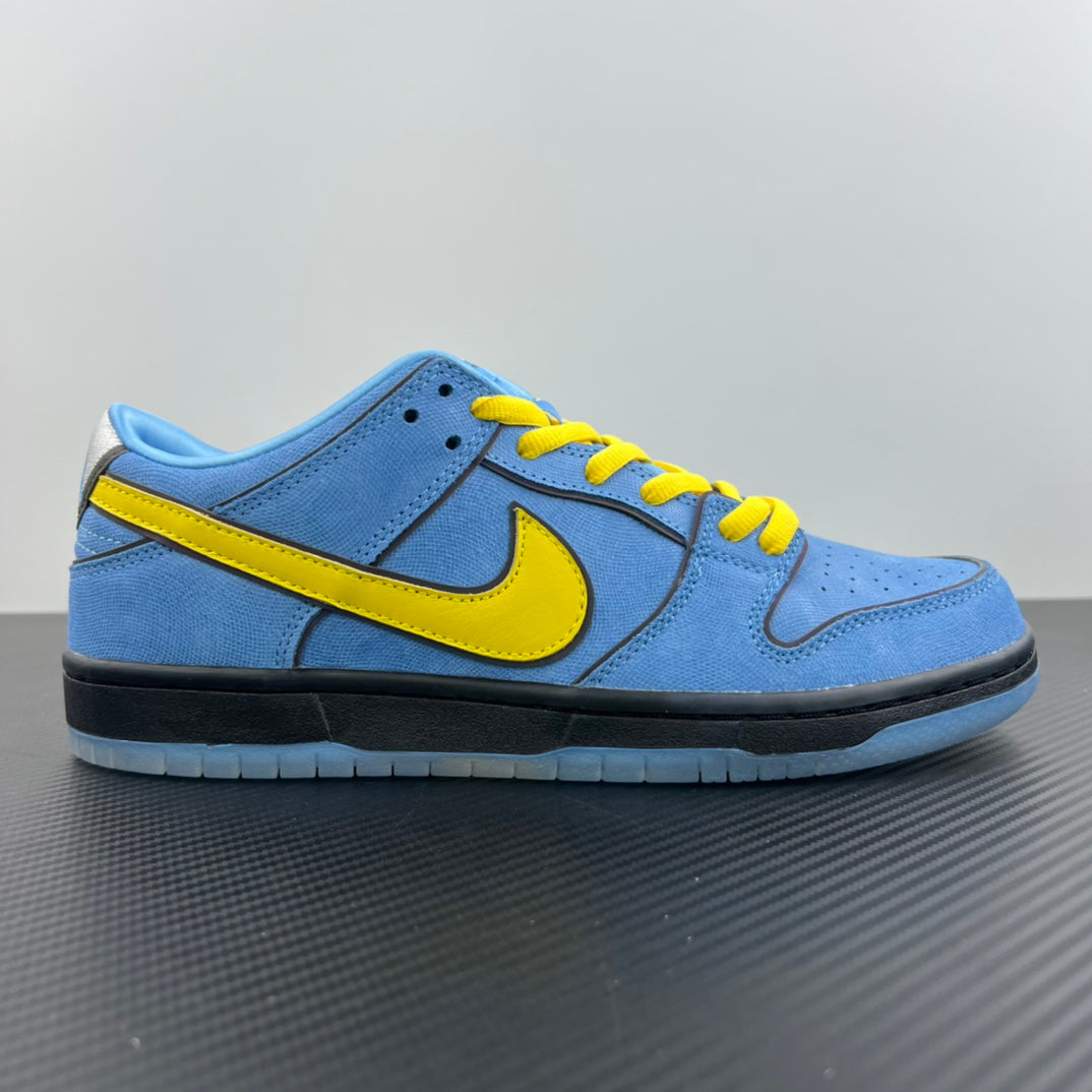 Blue low-top sneaker with yellow Swoosh stripe and yellow lace-up front