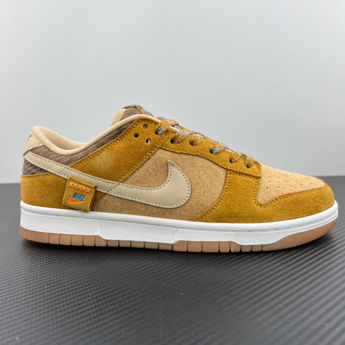 Suede low-top sneakers with white swoosh, mustard panels, and lace-up front