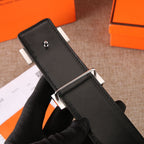 Black leather belt with metal buckle frame and adjustable bar