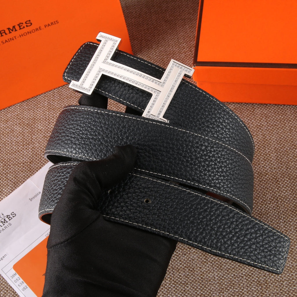 Black leather belt with stitched strap and metal clasp hardware