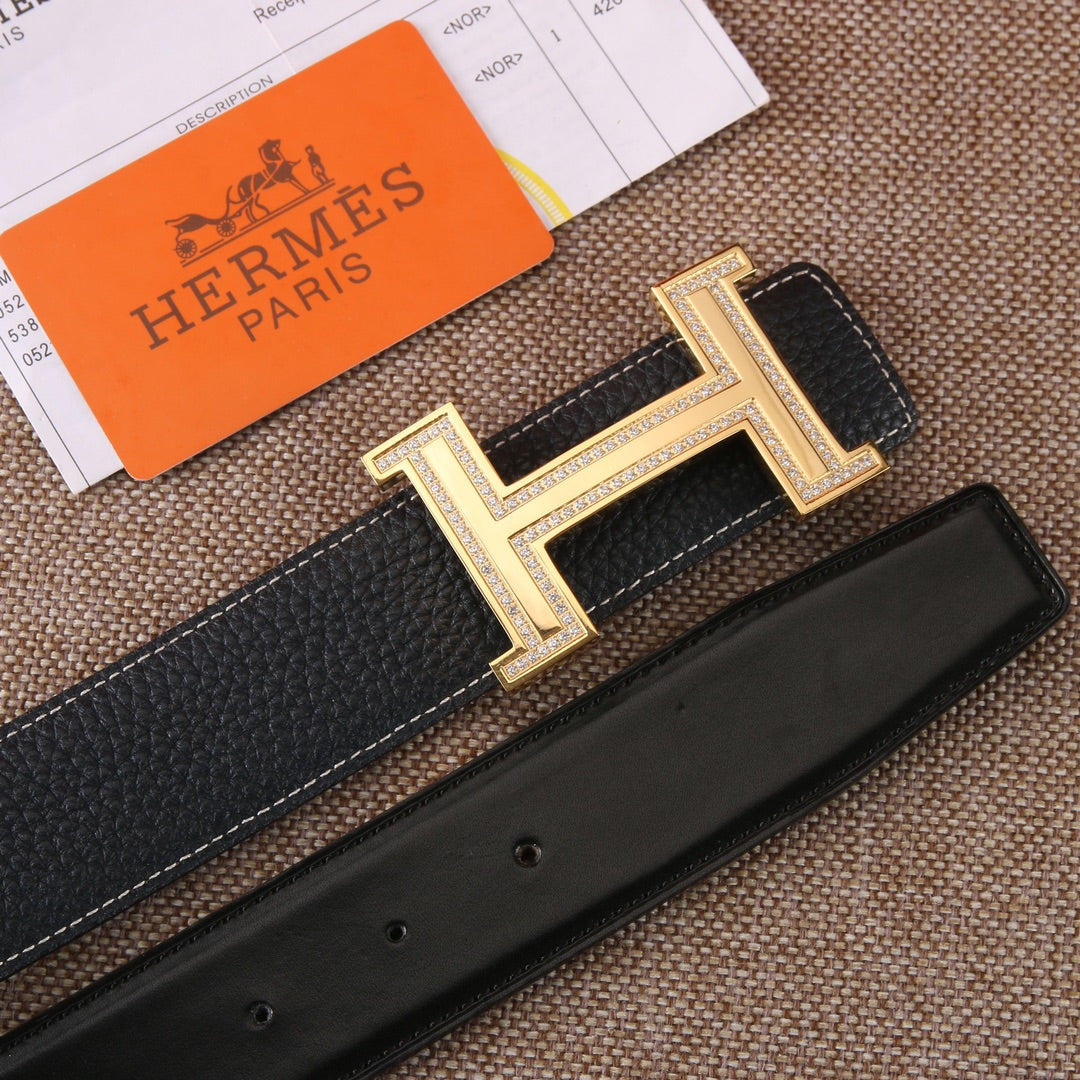 Black leather belt with gold-tone H buckle and strap keeper