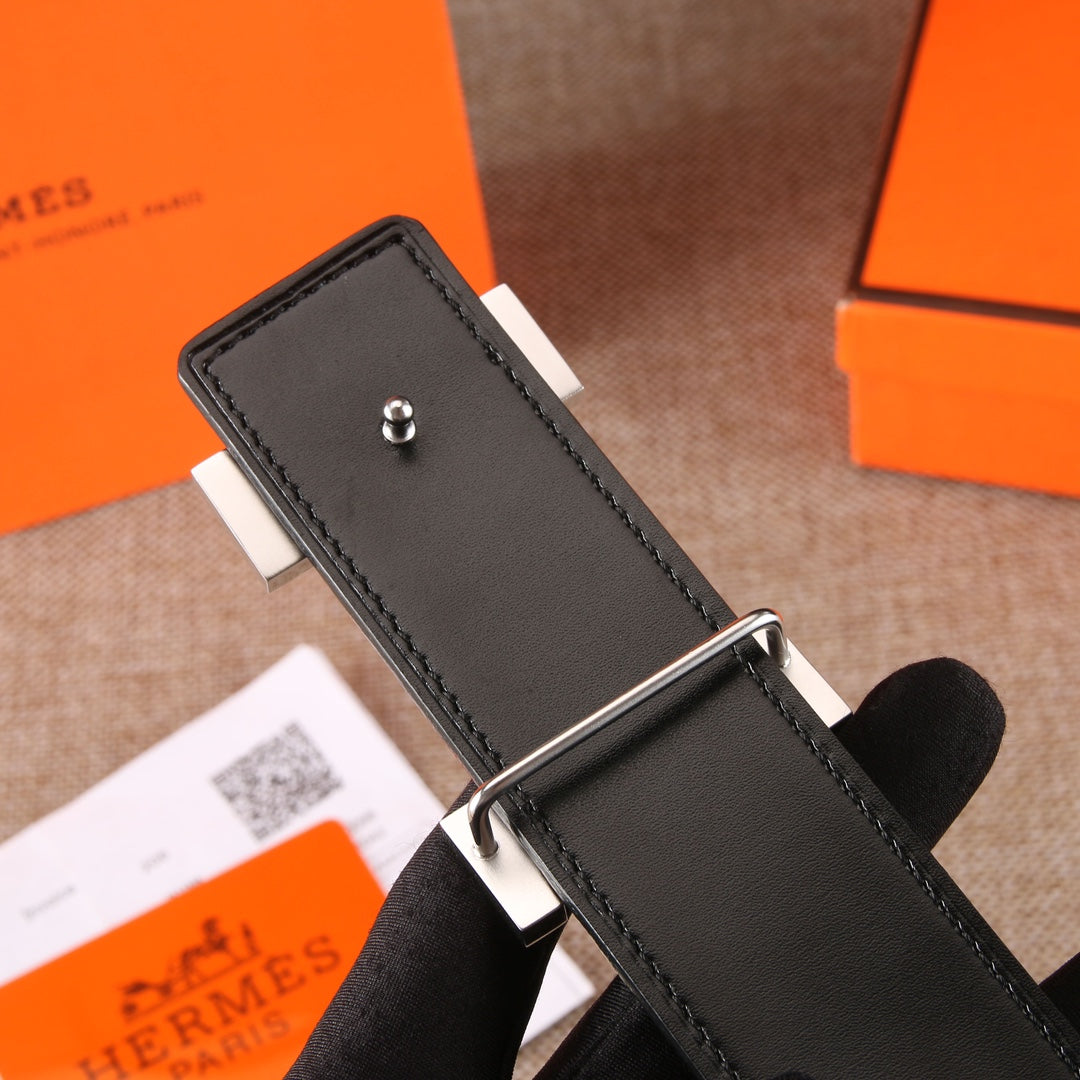 Hermes leather belt strap end with silver buckle bar and stitched dark brown leather