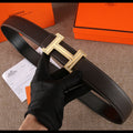 Hermes leather belt, dark brown, with gold H buckle and rhinestone trim