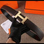 Hermes leather belt, dark brown, with gold H buckle and rhinestone trim