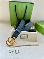 Gucci belt and buckle set: dark blue monogram leather with gold-tone GG