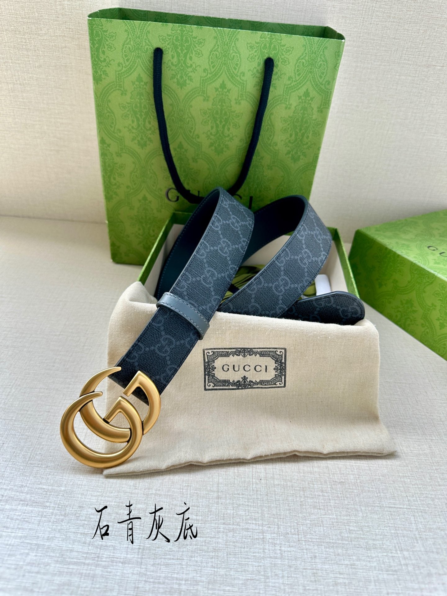 Gucci belt and buckle set: dark blue monogram leather with gold-tone GG