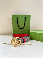 Gucci GG canvas belt with red trim and gold double-G buckle