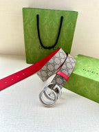 Gucci GG canvas belt with red leather edge and silver double-G buckle
