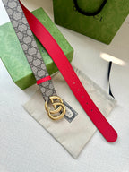 Gucci GG canvas belt with red strap and gold interlocking double-G buckle