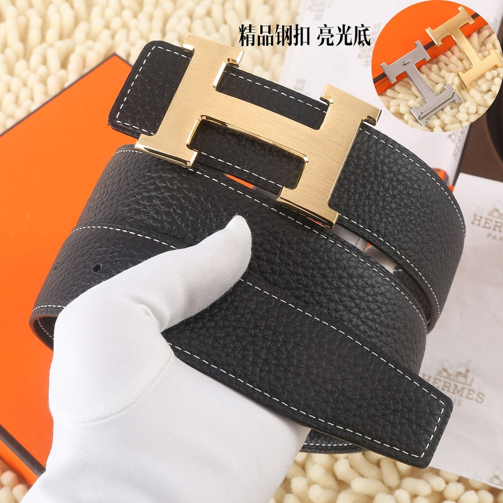 Black leather belt, gold-tone buckle, stitching and keeper section