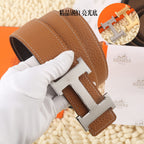 Hermes brown leather belt with silver-tone H buckle and stitched leather edges