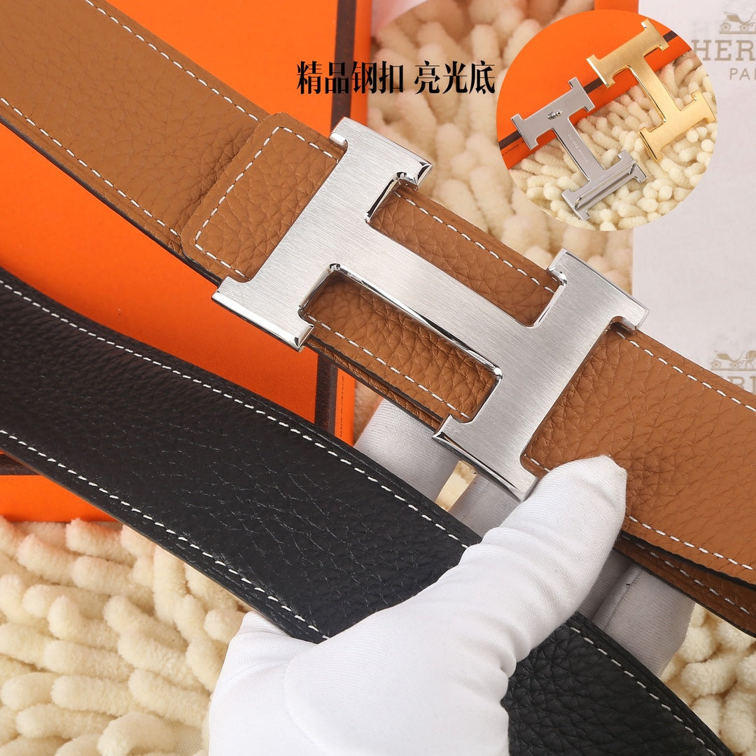Hermes belt close-up: brown and black leather, silver-tone H buckle
