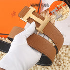 Hermes brown leather belt with silver-tone buckle and stitched strap detail