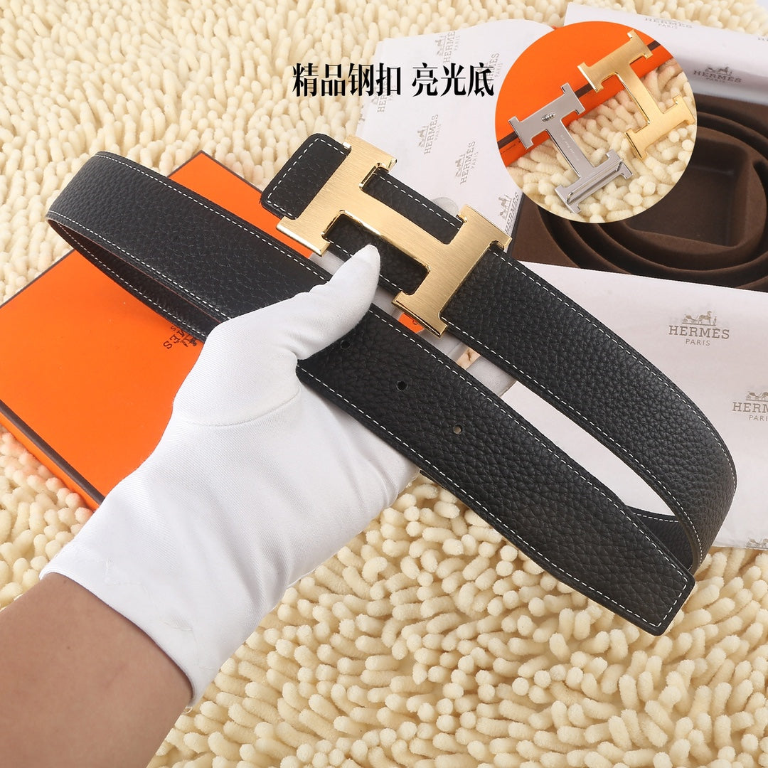 Black leather belt, large silver buckle, full strap view