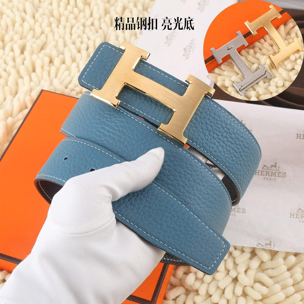 Blue pebbled leather belt with silver-tone buckle and stitched keeper tab detail
