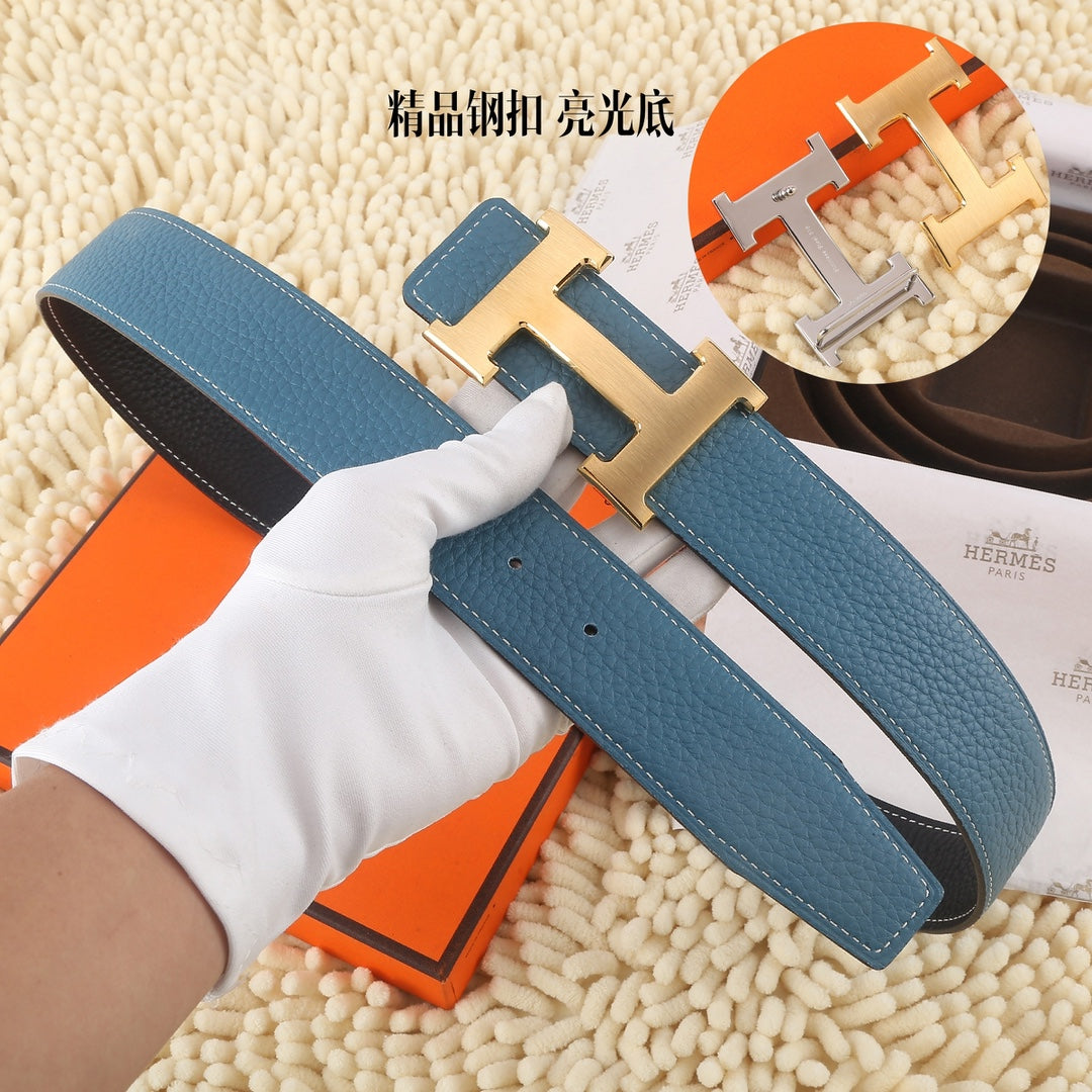 Blue leather belt with silver-tone buckle hardware and multiple size holes