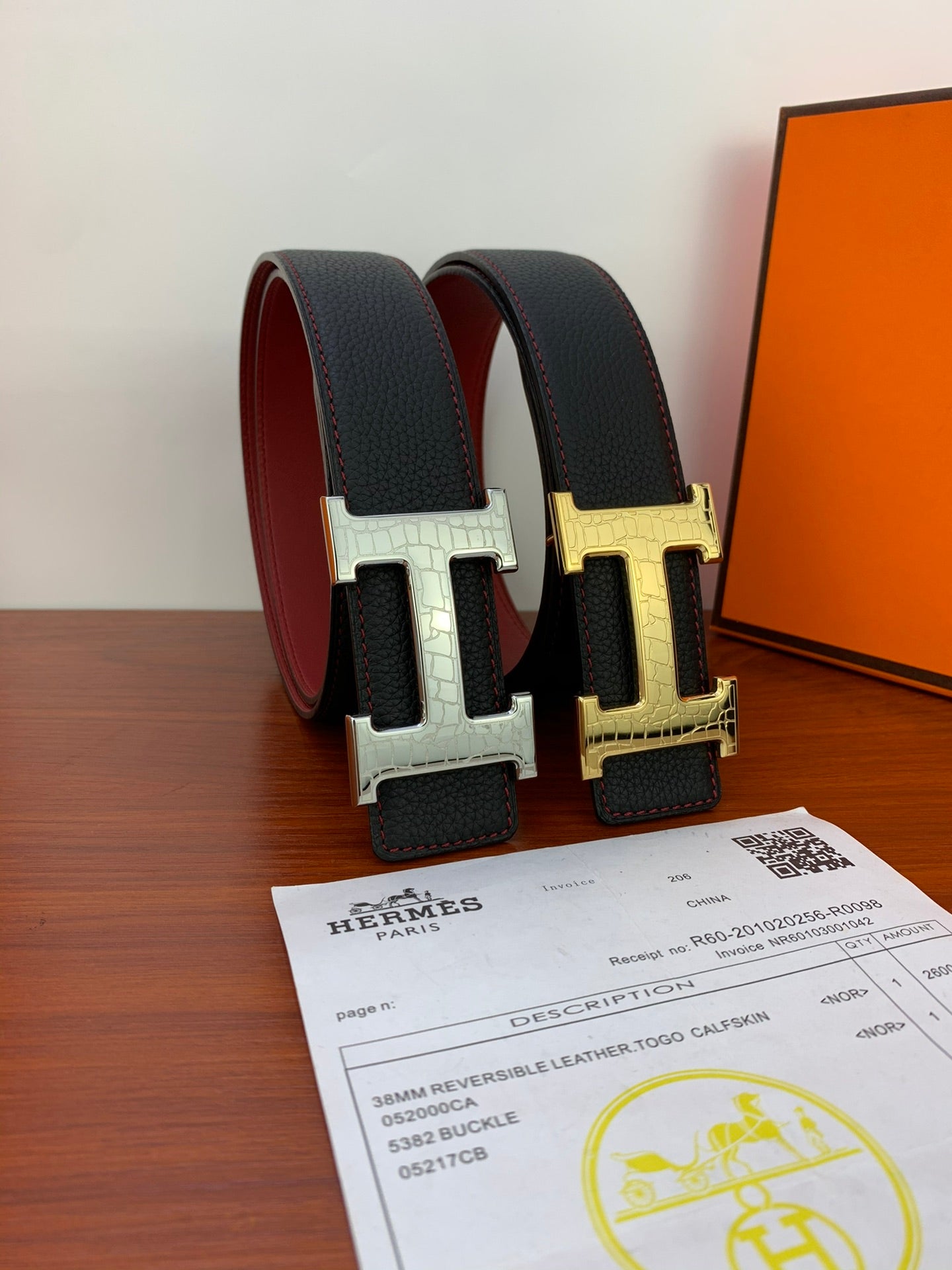Hermes reversible leather belt, two-sided buckle shown in black and gold tones
