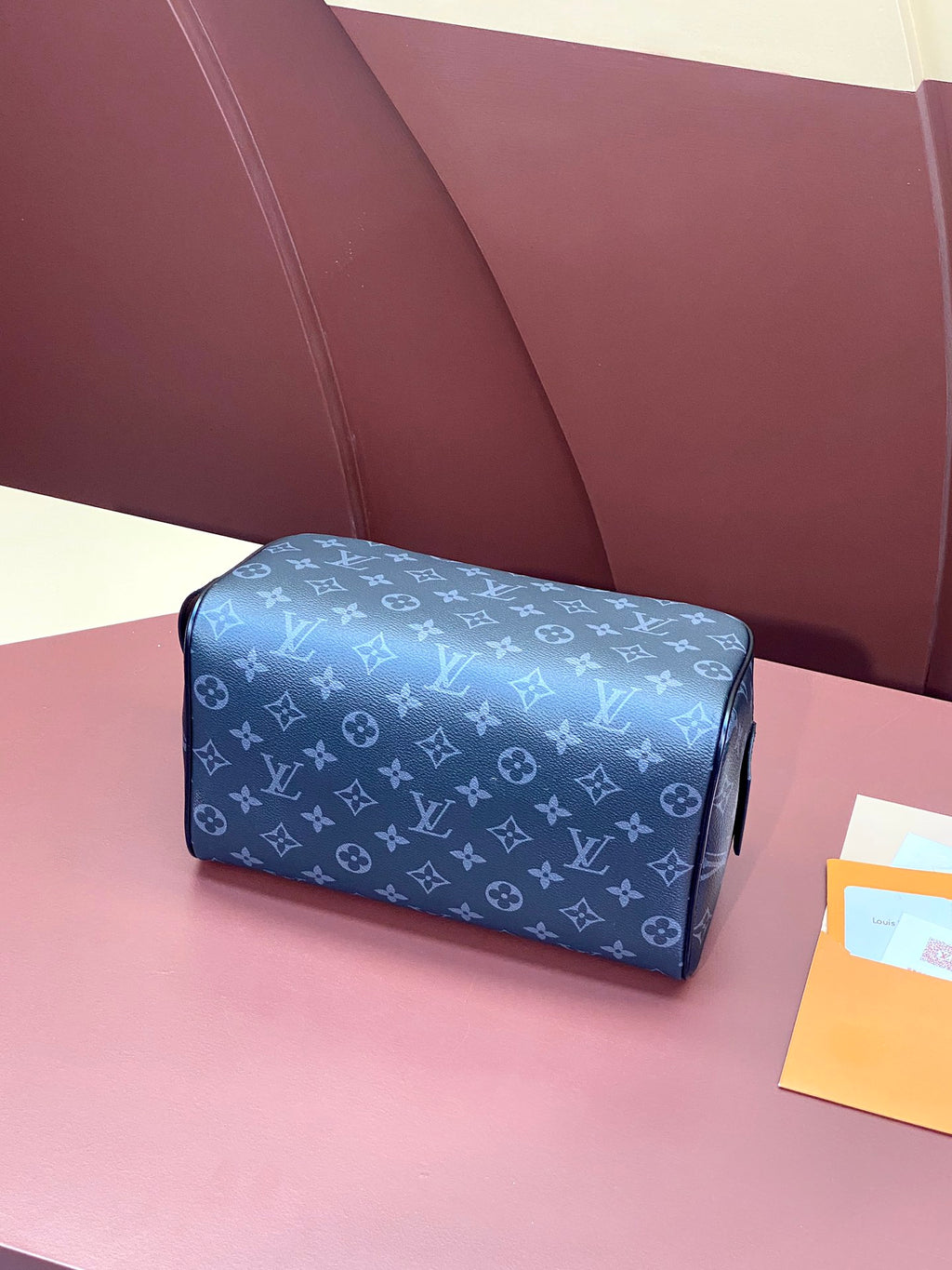 Louis Vuitton monogram bag in blue with zip closure, front view