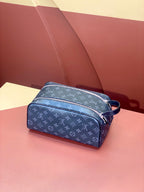 Louis Vuitton monogram bag in blue with side zip pocket detail