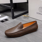 Versace brown leather loafer on tan insole, slip-on design with stitched edges