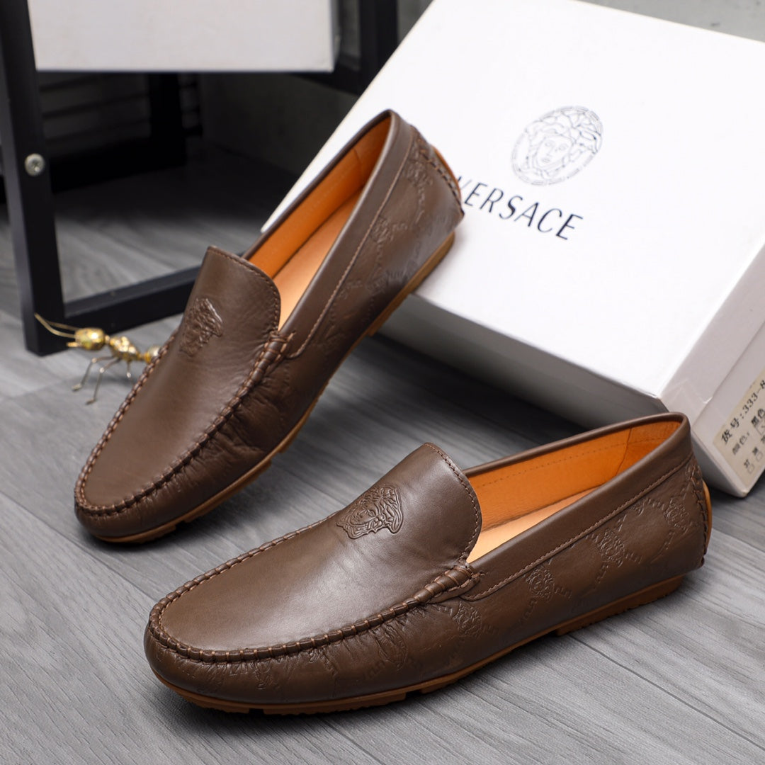 Versace brown leather loafers with stitched moc-toe and embossed emblem, pair view