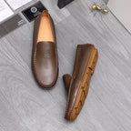 Versace brown leather loafers, front view and outsole profile with textured tread