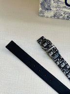 Dior belt with navy leather strap, silver buckle, and monogram webbing