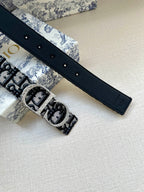 Dior belt with dark blue leather strap, silver-tone buckle, and punched holes.