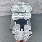 Balenciaga unisex sneaker outsole, white tread with dark center and molded grip pattern.